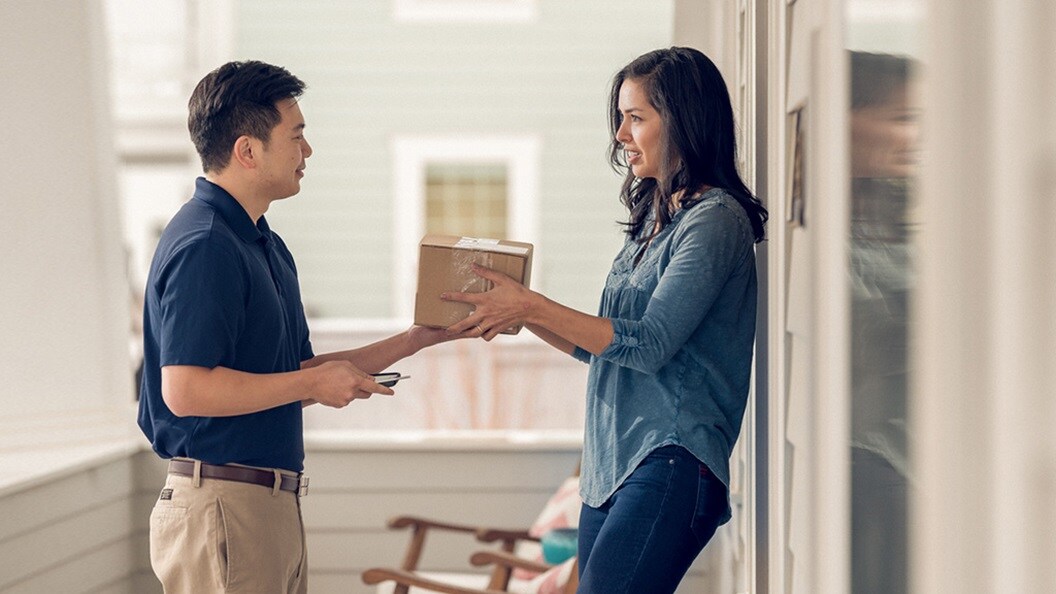 Woman receiving goods from ecommerce