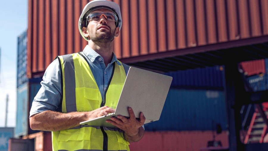 Men holding laptop