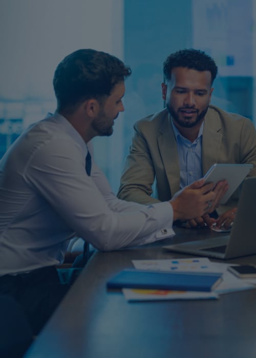 Two business professionals discussing ocean contract 